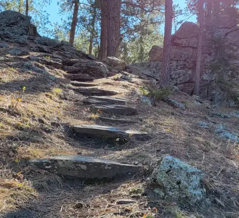 Steps leading to a unique rock formation