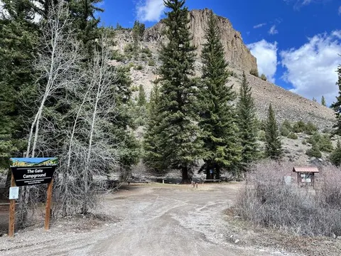 The Gate Campground entrance, sign, view of The Gate geologic feature