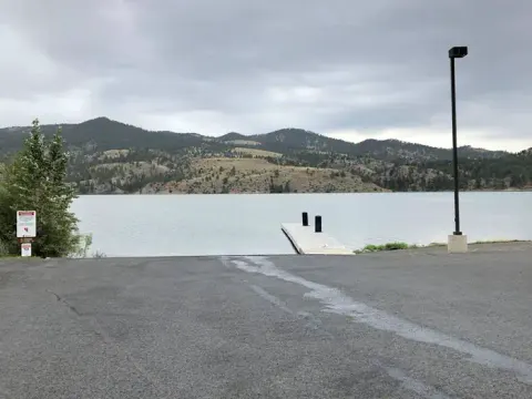 BLM White Sandy Campground courtesy dock with lighting with paved day use parking.