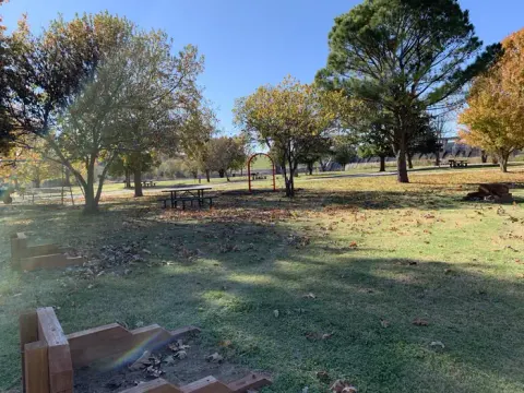 Handmade custom horseshoe games located near the playground accessible to guests in the park.