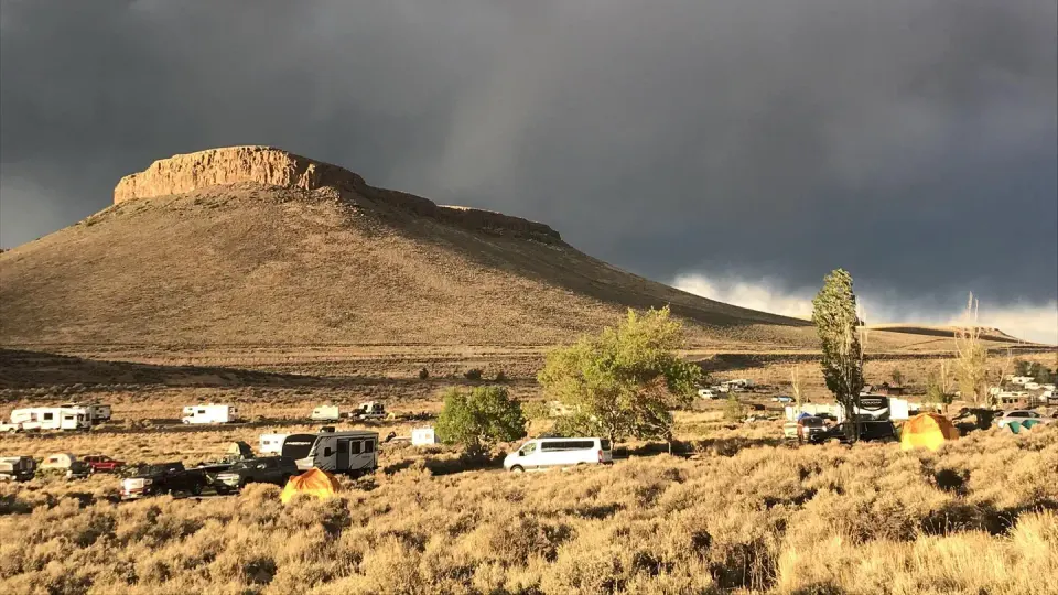 Dramatic Dark Clouds over a Butte form the backdrop of Elk Creek Campground