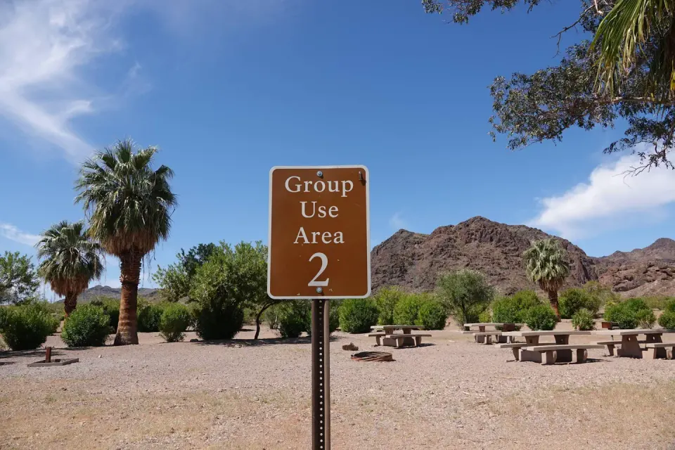 Campsite 2 sign located in an open desert setting