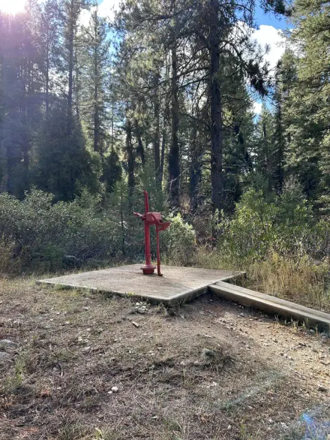 Red hand pump for water